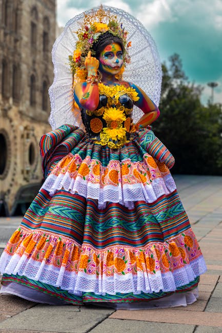 Vibrant Day of the Dead costume with face paint, flowers, outdoors, festive atmosphere.